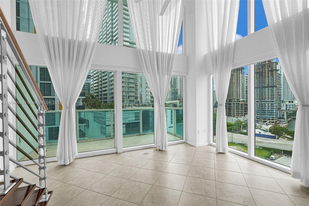 Open Floorplan Living Room - Corner Unit - Beautiful views to the River & Brickell Skyline - Automated/Motorized Window Shades - True Urban Living