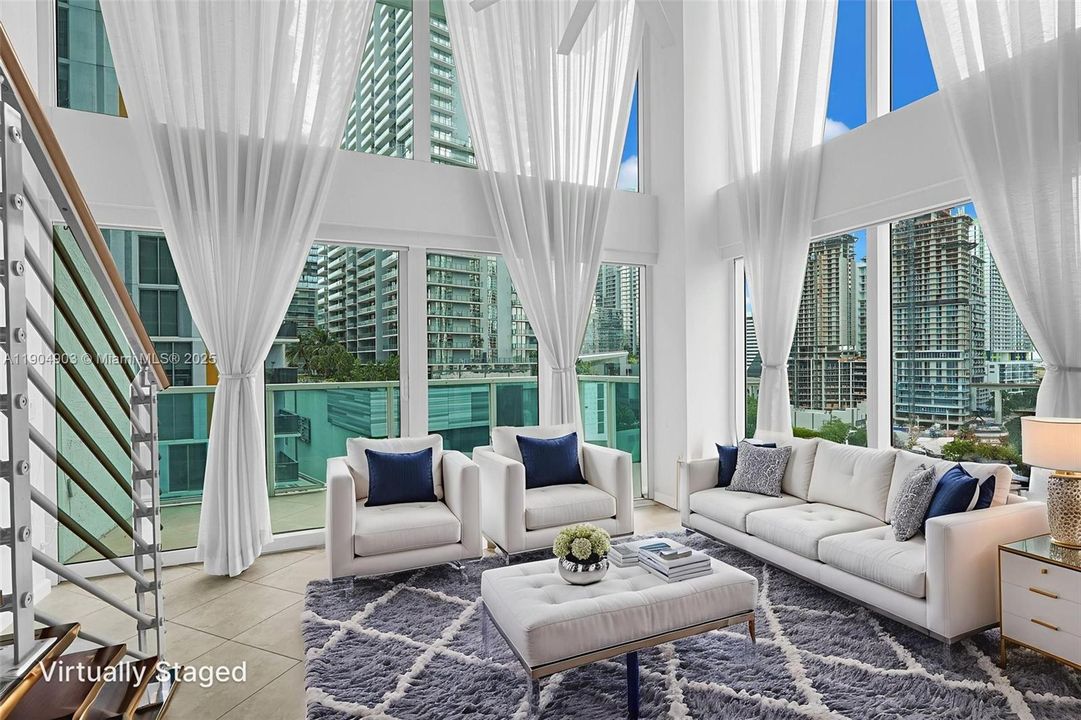 Virtual Staged Photo - Open Floorplan Living Room - Corner Unit - Beautiful views to the River & Brickell Skyline -