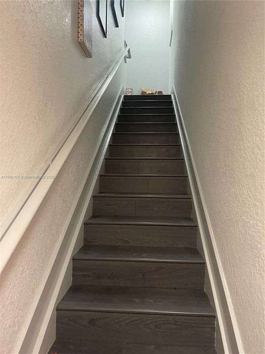 stairs going up to the unit from entrance