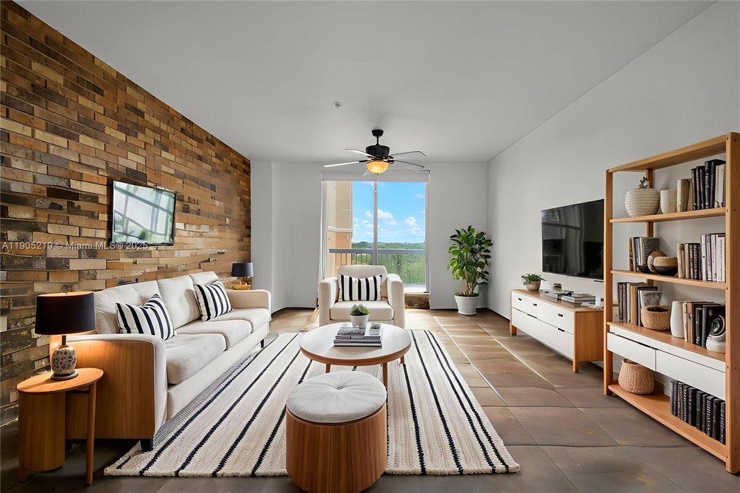 Ample living room with a great view and access to a large balcony with impact windows (virtually staged)