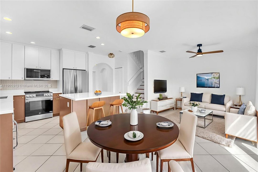 Virtually staged dining living area.