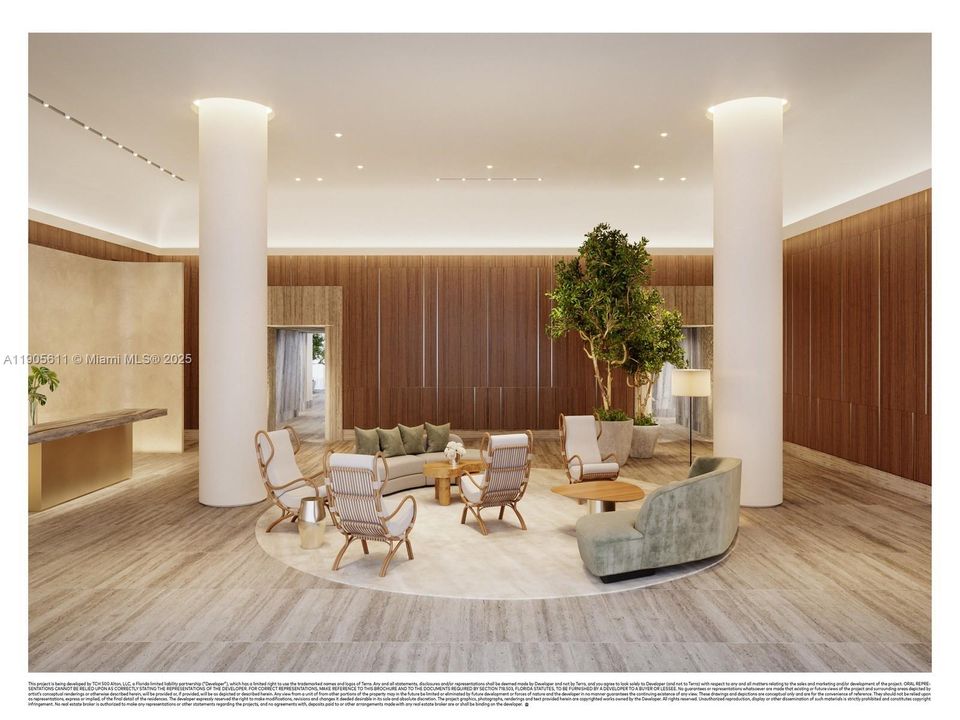 Elegant lobby at Five Park Miami Beach designed by Gabellini Sheppard with natural materials and warm, modern finishes.