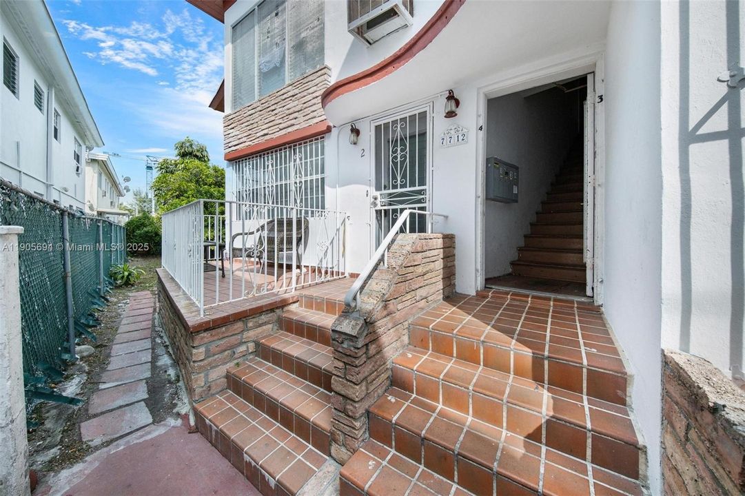 entrance facing south, balcony faces garden