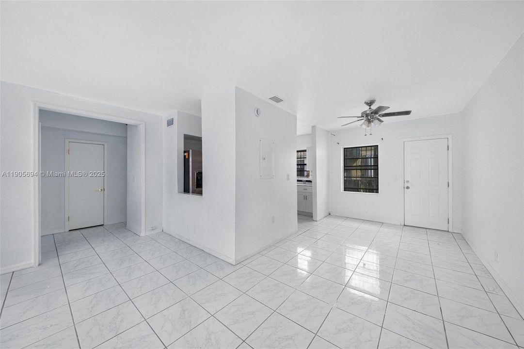 Dining Room, kitchen and hallway to bedrooms