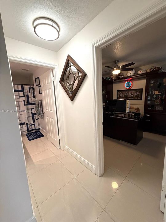 Hallway to bathroom and bedrooms