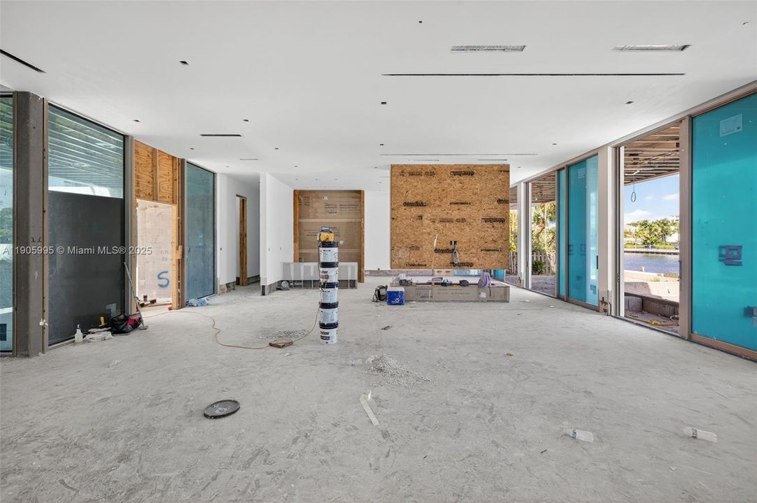 Actual photo as of Oct 31, 2025. Area on the left (behind the drywall cans) will be a wet bar with wine cooler and feature wall in keystone.