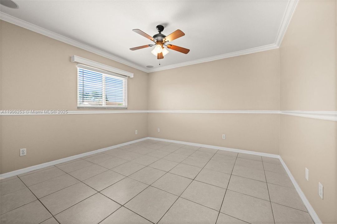 Bedroom 3 with Chair rail and crown molding