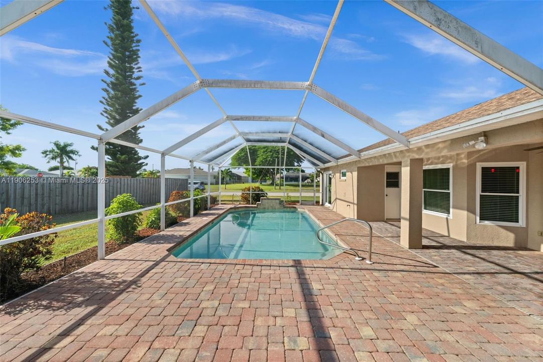 Pool and Lanai surrounded by pavers