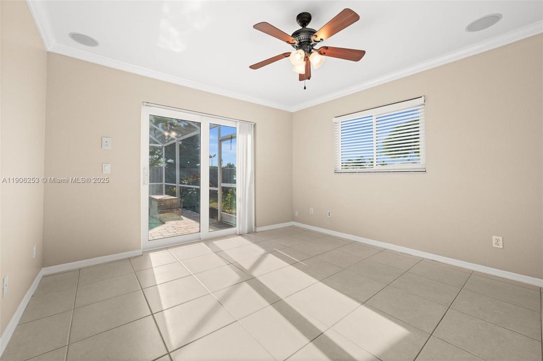 Bedroom 2 opens to the pool
