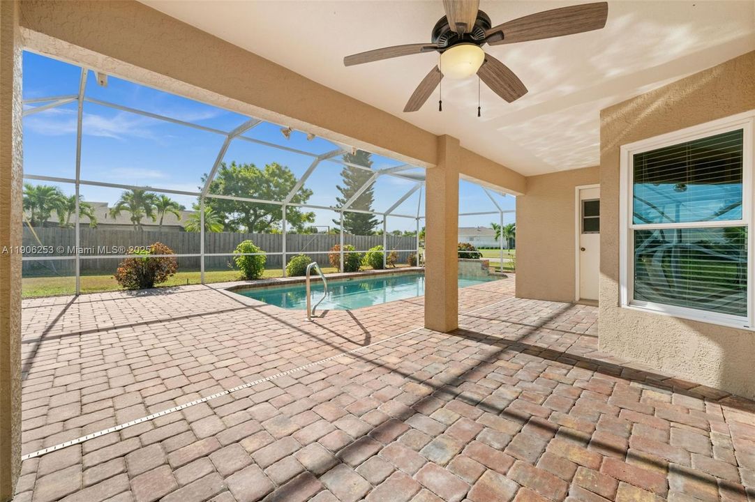 Large covered lanai next to the pool