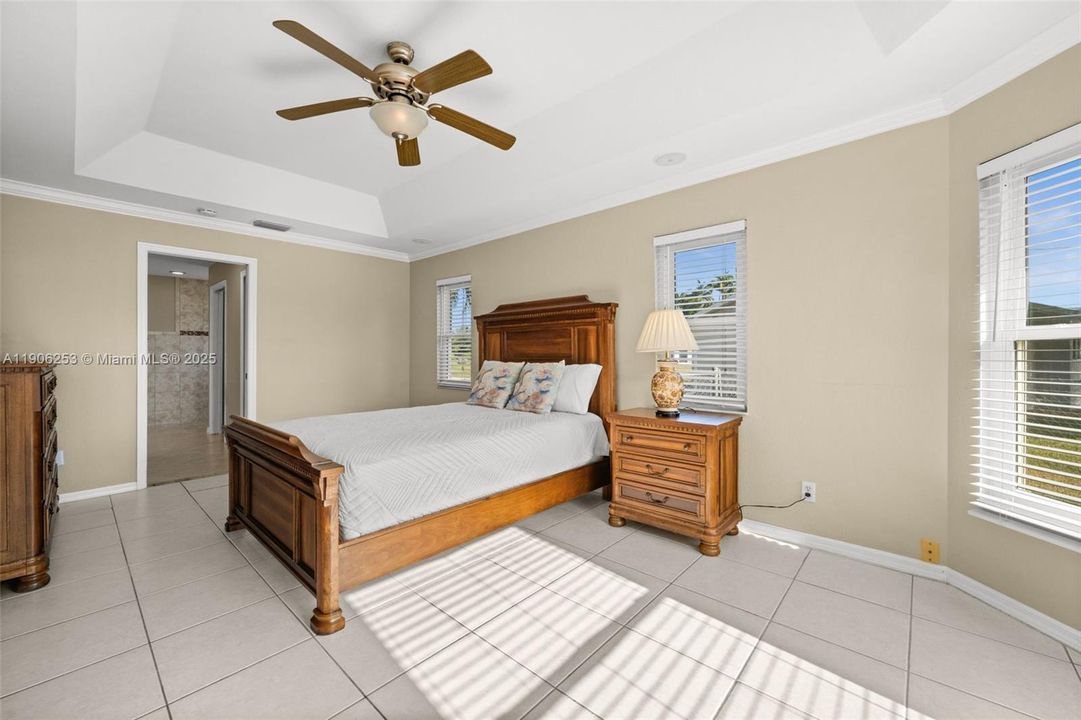 Master bedroom with ensuite bath and walk-in closet