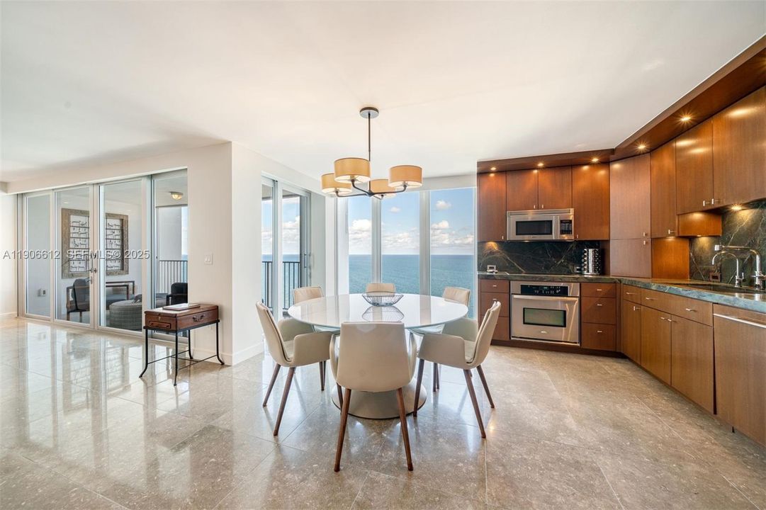 Dining and kitchen area with amazing ocean views.