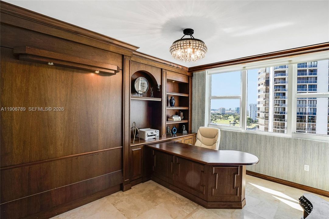 Office features a custom Murphy bed — perfect for guests or flexible use.