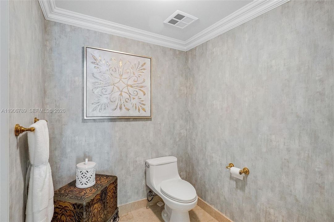 Expansive master bathroom with two separate toilets.