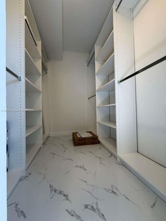 BUILT OUT WALK IN CLOSET IN PRIMARY