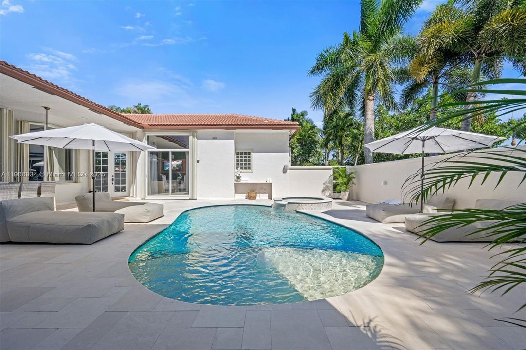 heated saltwater pool and courtyard