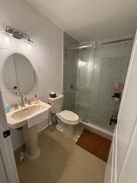 Master bath view - shower area with glass door enclosure