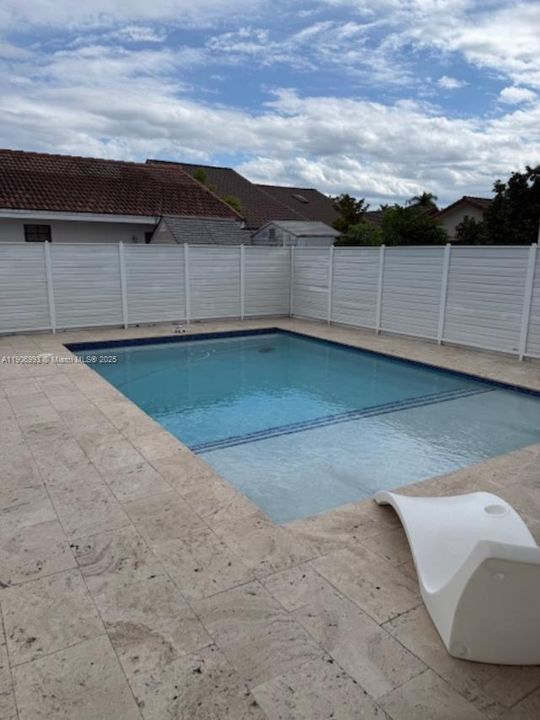 Pool with beach area