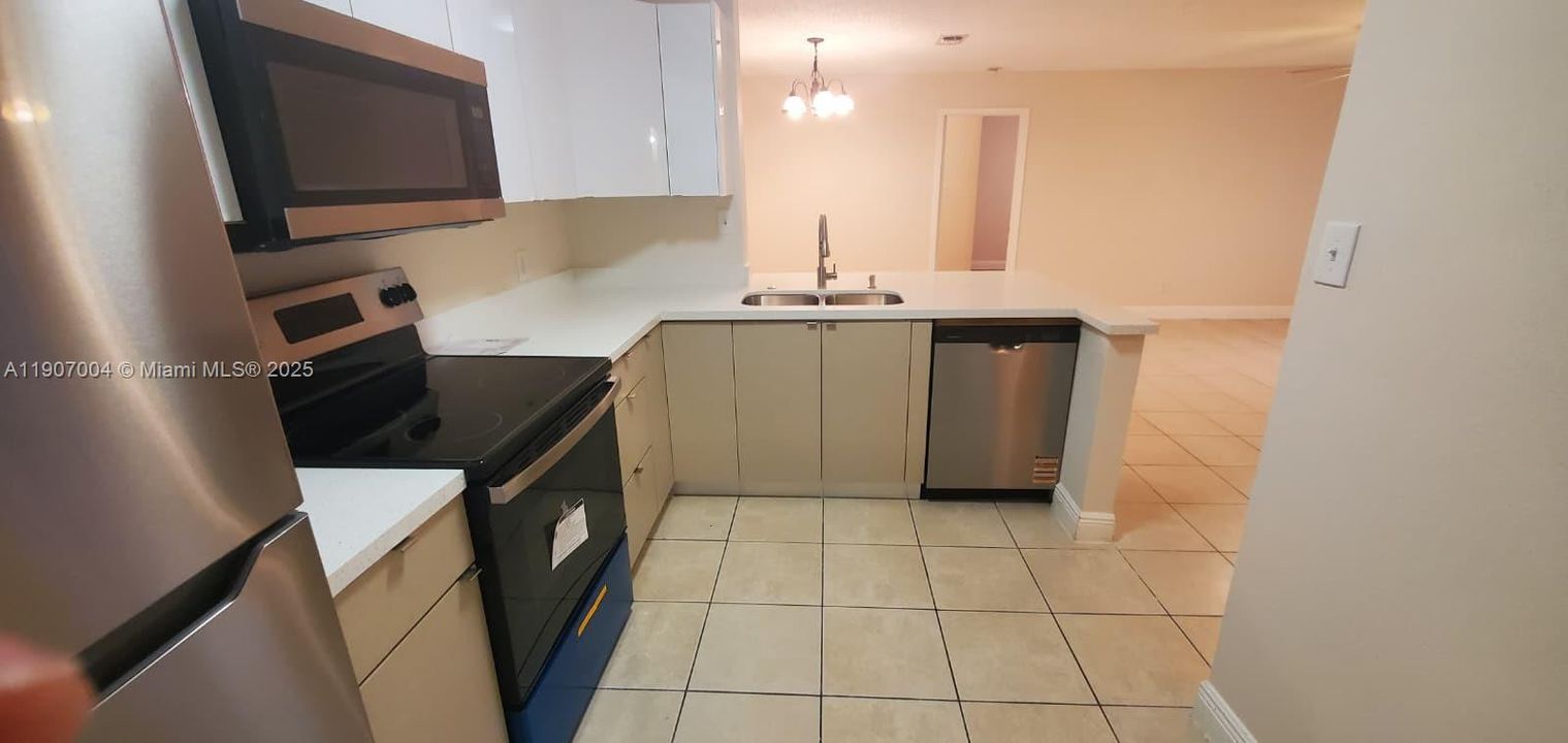 REMODELED 2 bedroom / 2 bath apartment with BRAND NEW KITCHEN CABINETRY, BRAND NEW STAINSLESS STEEL APPLIANCES & TILE & LAMINATE FLOORING.