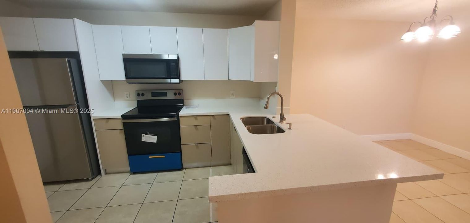 REMODELED 2 bedroom / 2 bath apartment with BRAND NEW KITCHEN CABINETRY, BRAND NEW STAINSLESS STEEL APPLIANCES & TILE & LAMINATE FLOORING.