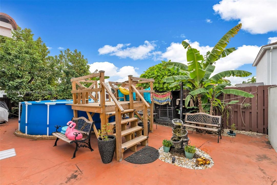 ABOVE GROUND POOL W/ DECK.