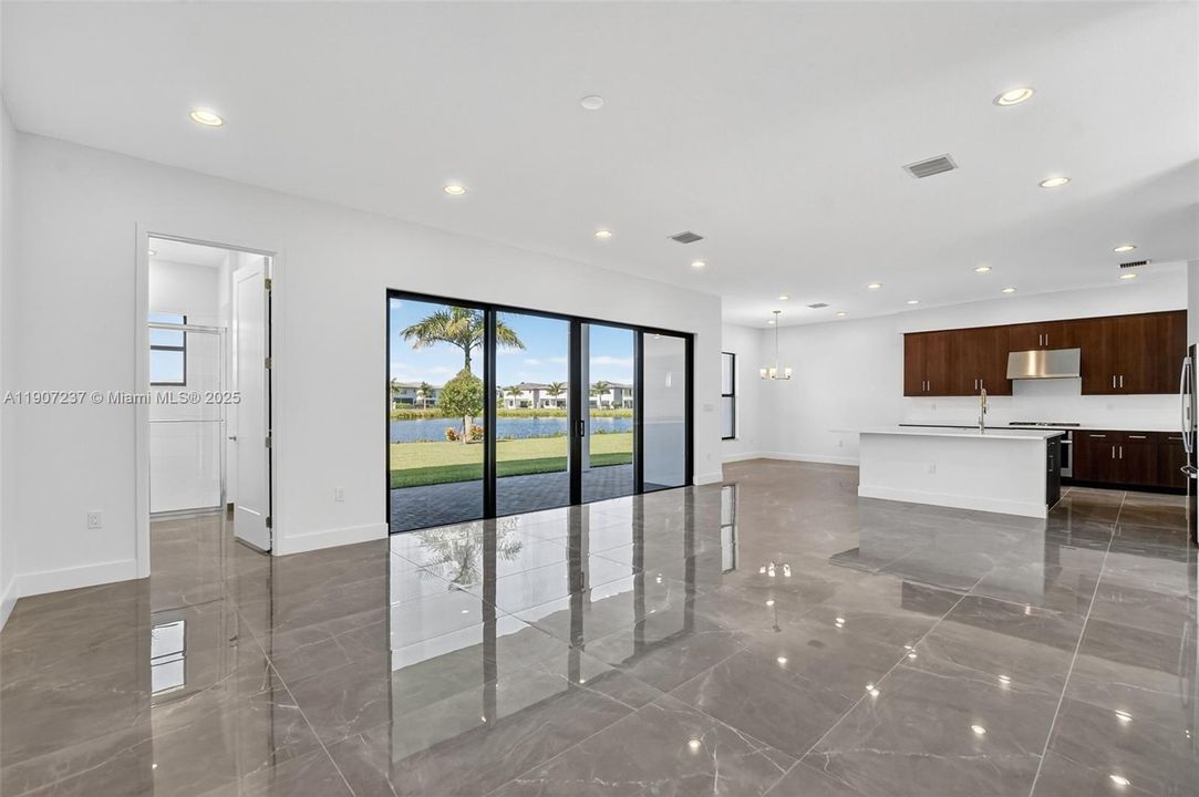 living room/tv room overlooking kitchen