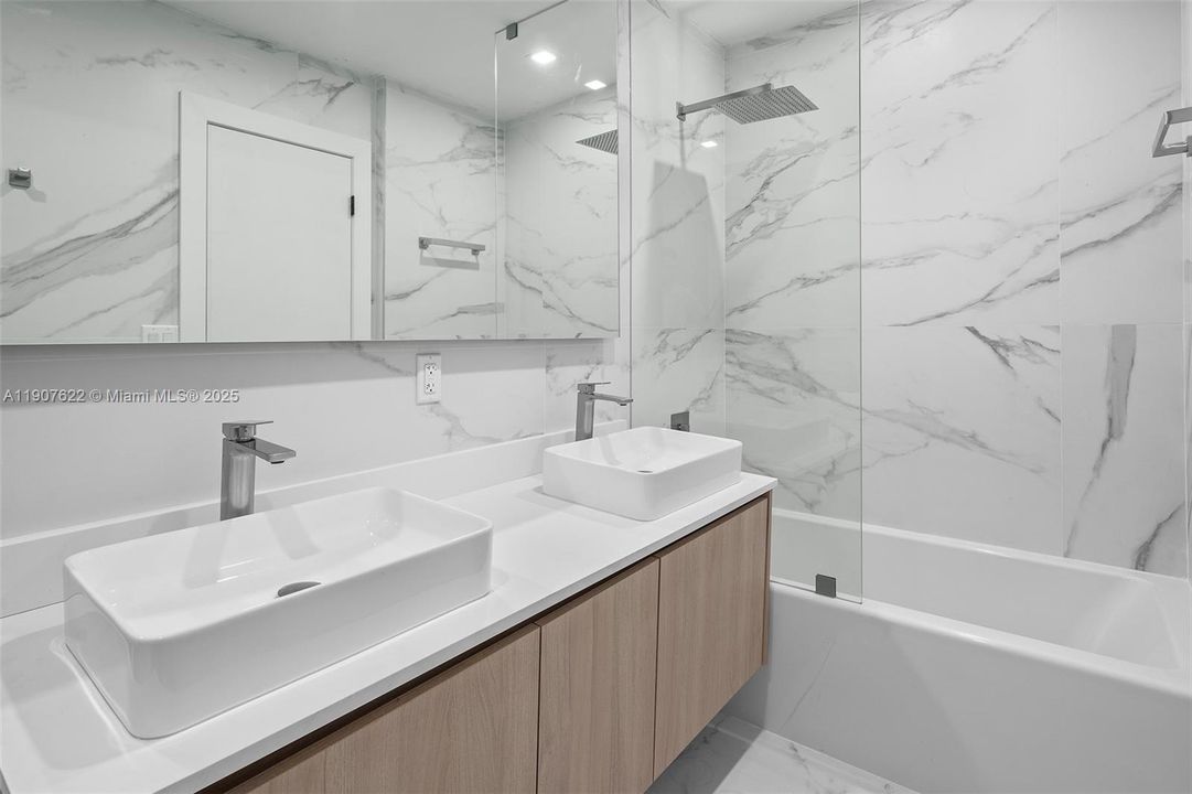 3rd, 4th & 5th Bedrooms share this bathroom with double sinks.