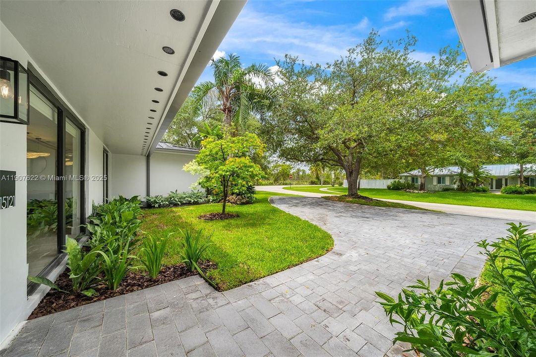 Corner lot luxury—this expansive 21,875 sq ft property offers privacy, prestige, and a rare sense of openness in a fully rebuilt setting.