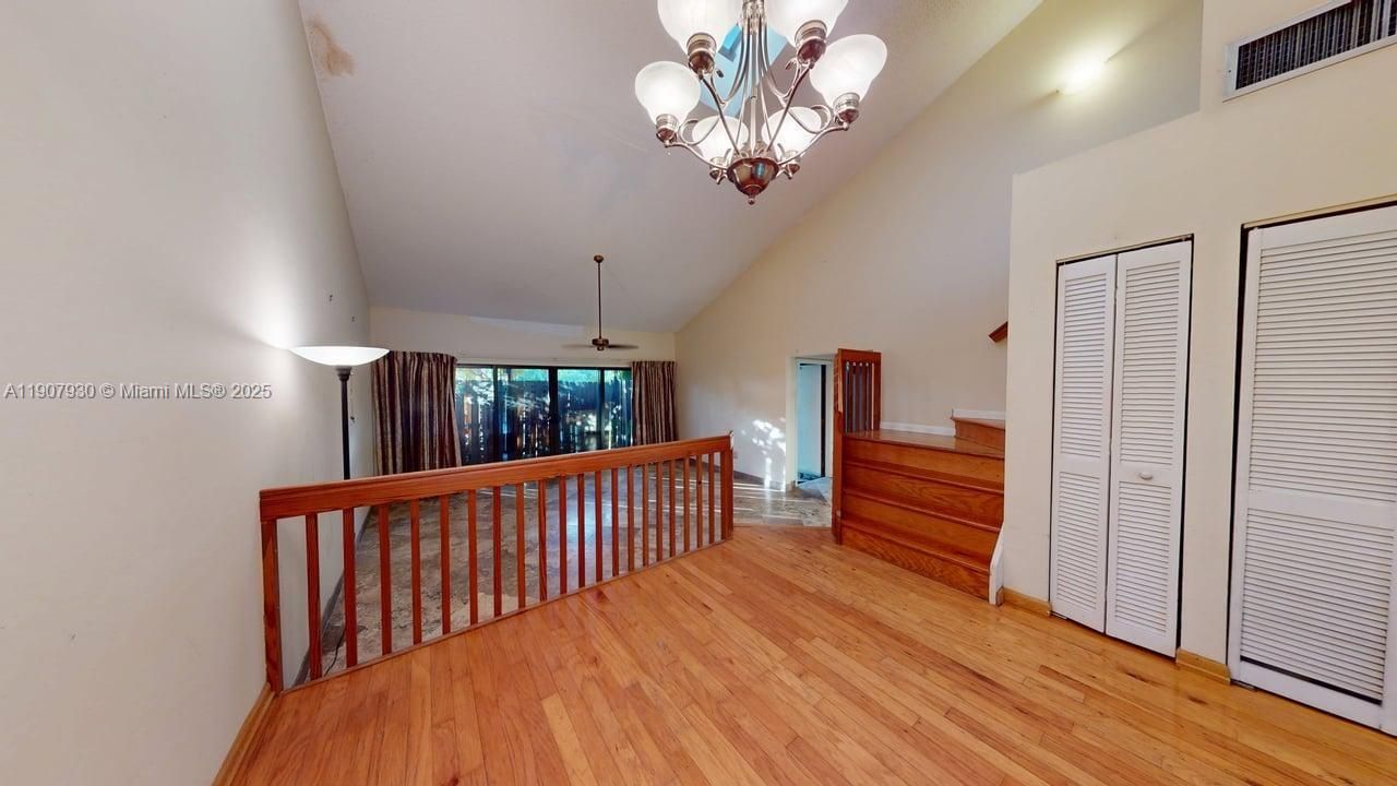 Inviting dining space with warm designer flooring, perfect for entertaining or intimate family meals.