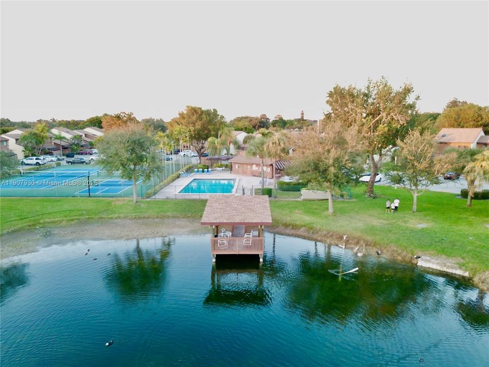 Enjoy tranquil lakefront living from your own covered dock, surrounded by wildlife, swans, and serene from the backyard.