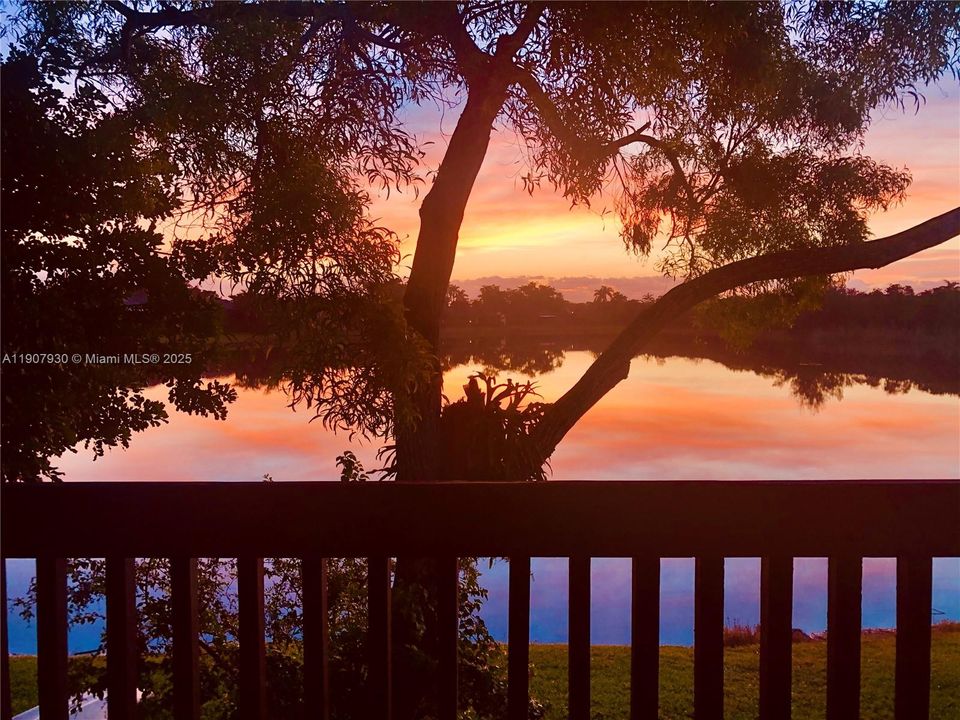 Unwind each evening with breathtaking sunset views over the tranquil lake, your private slice of South Florida paradise.