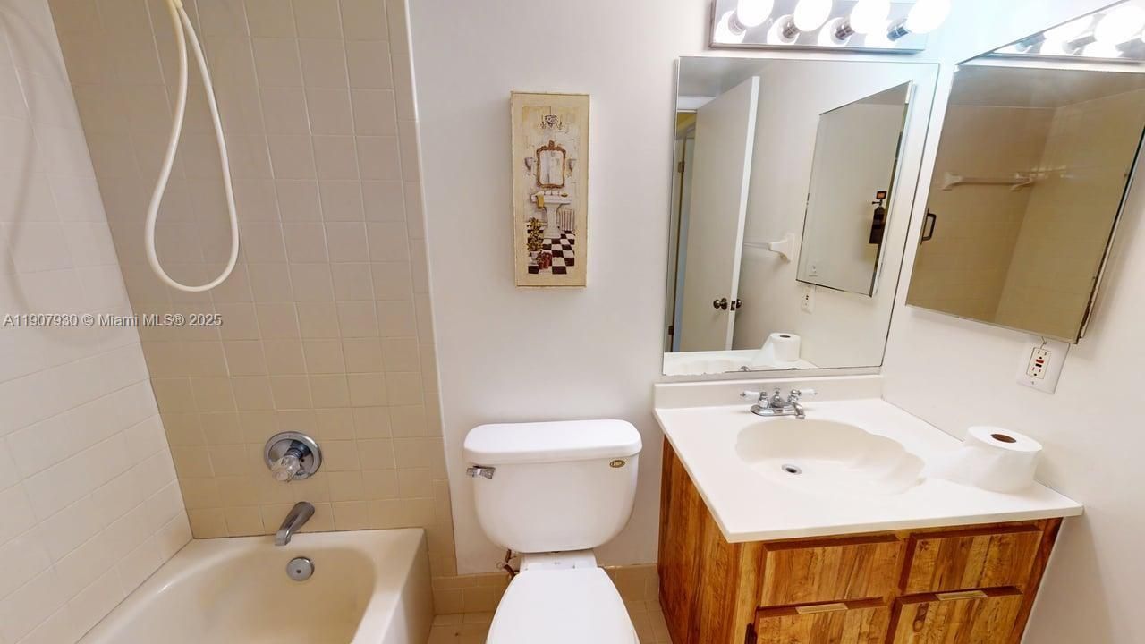 Crisp and inviting bathrooms showcasing clean lines, updated vanities, and a soothing atmosphere throughout.