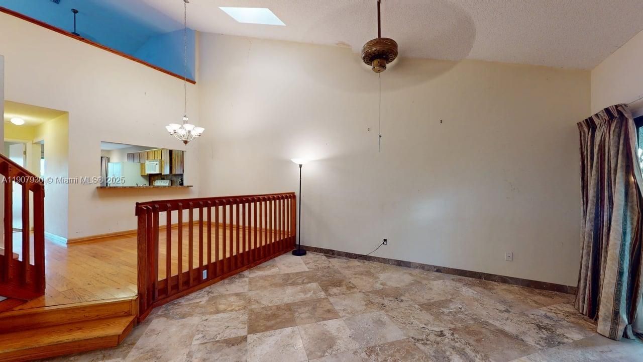 Relaxing primary suite with soaring ceilings, warm light, and peaceful views to wake up inspired every morning.