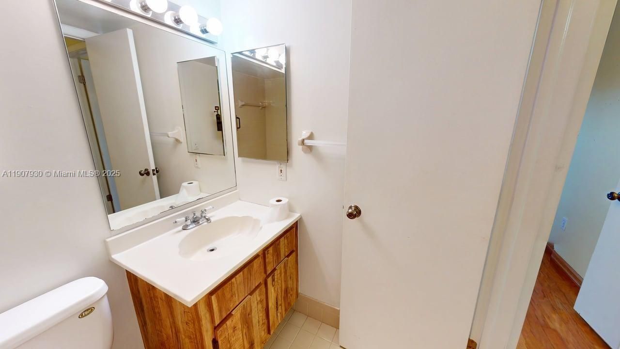 Crisp and inviting bathrooms showcasing clean lines, updated vanities, and a soothing atmosphere throughout.