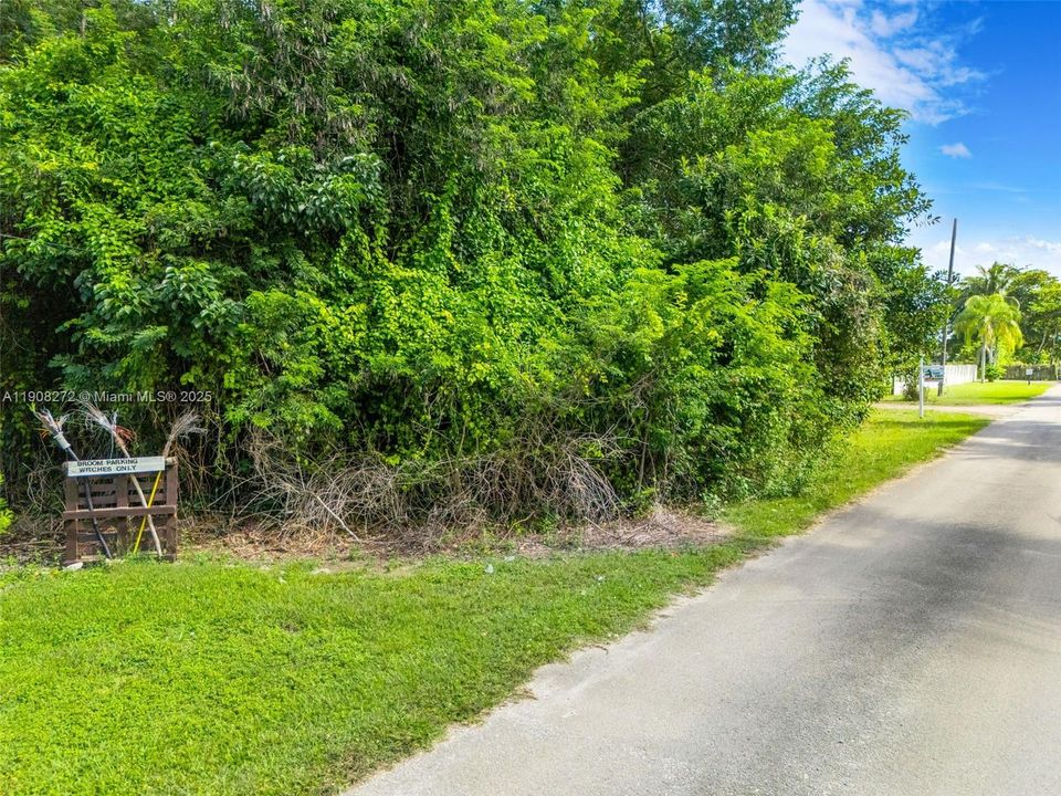 STREET VIEW OF THE 1.13 VACANT LAND LOT IN REDLAND ON A QUIET STREET. SW 197 AVE & SW 234 ST - SIGN ON PROPERTY