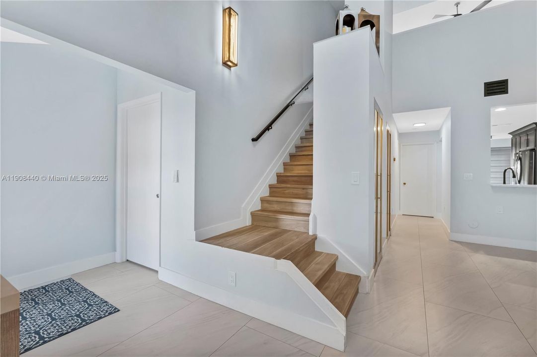 Open Staircase to Loft Primary Suite