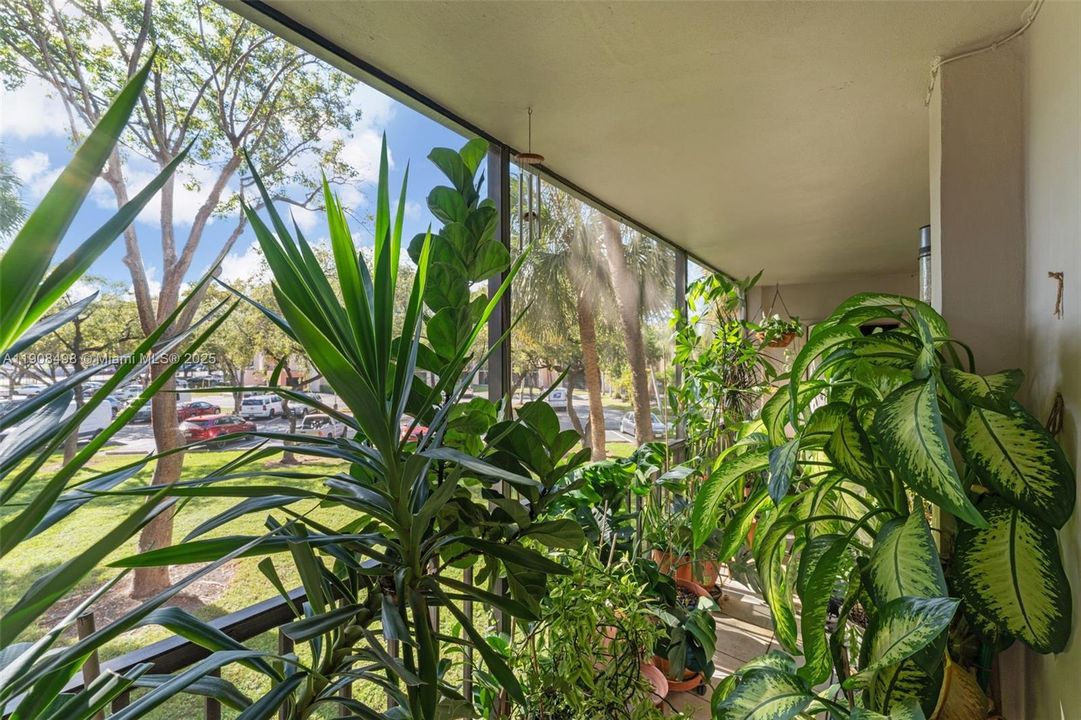 View of the parking area and green space.