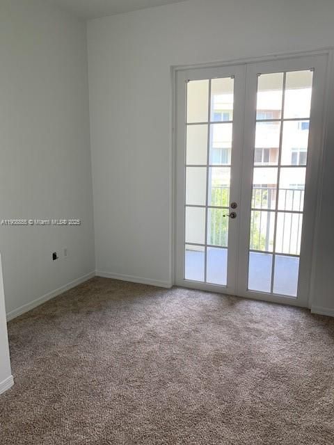 Bedroom leading to balcony