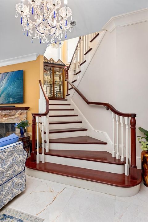 Elegant Stairway to Upper Levels