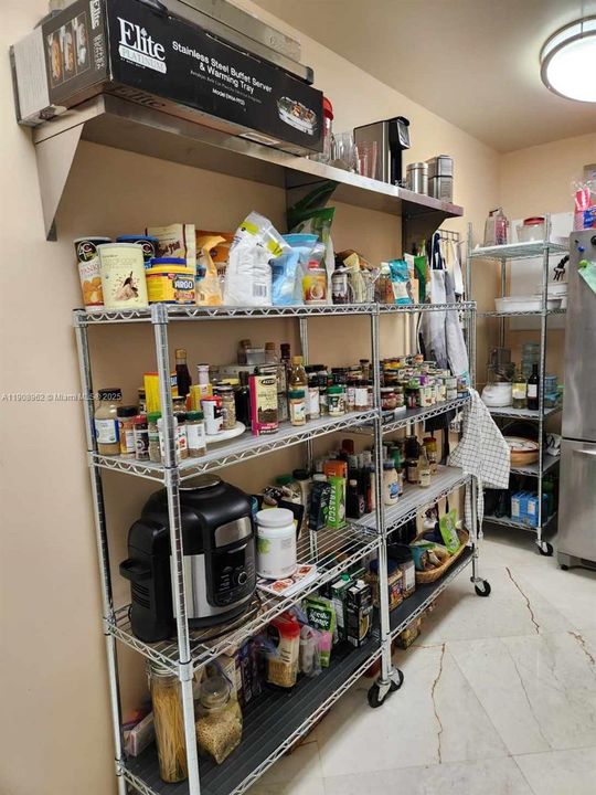 Catering Kitchen has Roll Out Shelving for  efficiency. Truly Fully Equipped for Entertaining.