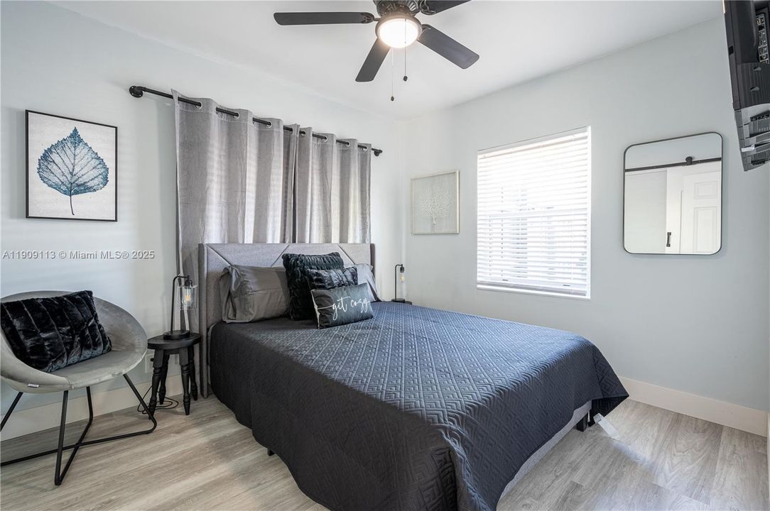 UNIT 1 - Bedroom 1 (TV & Build in Closet included)