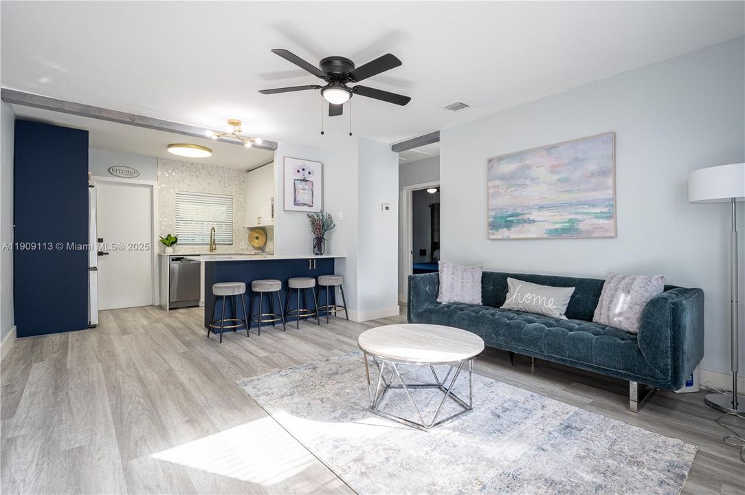 UNIT 2 - Open Area (Living and Kitchen All Furniture, Appliances, and Art Included)