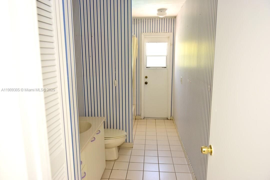 Bathroom with pool/patio access