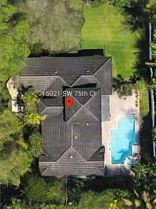 Aerial View of Property 1/3 Acre fenced property