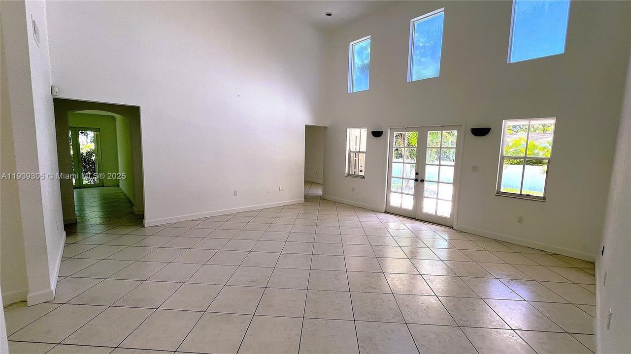 Living Room with High Ceiling