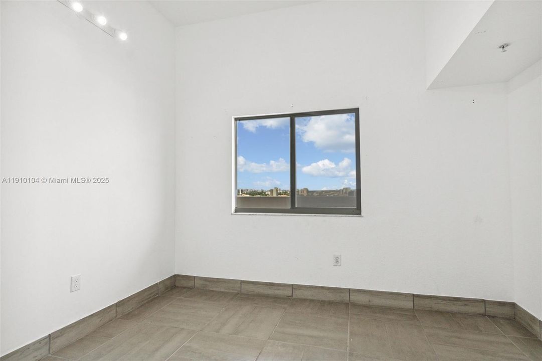 2nd bedroom/office with open closet