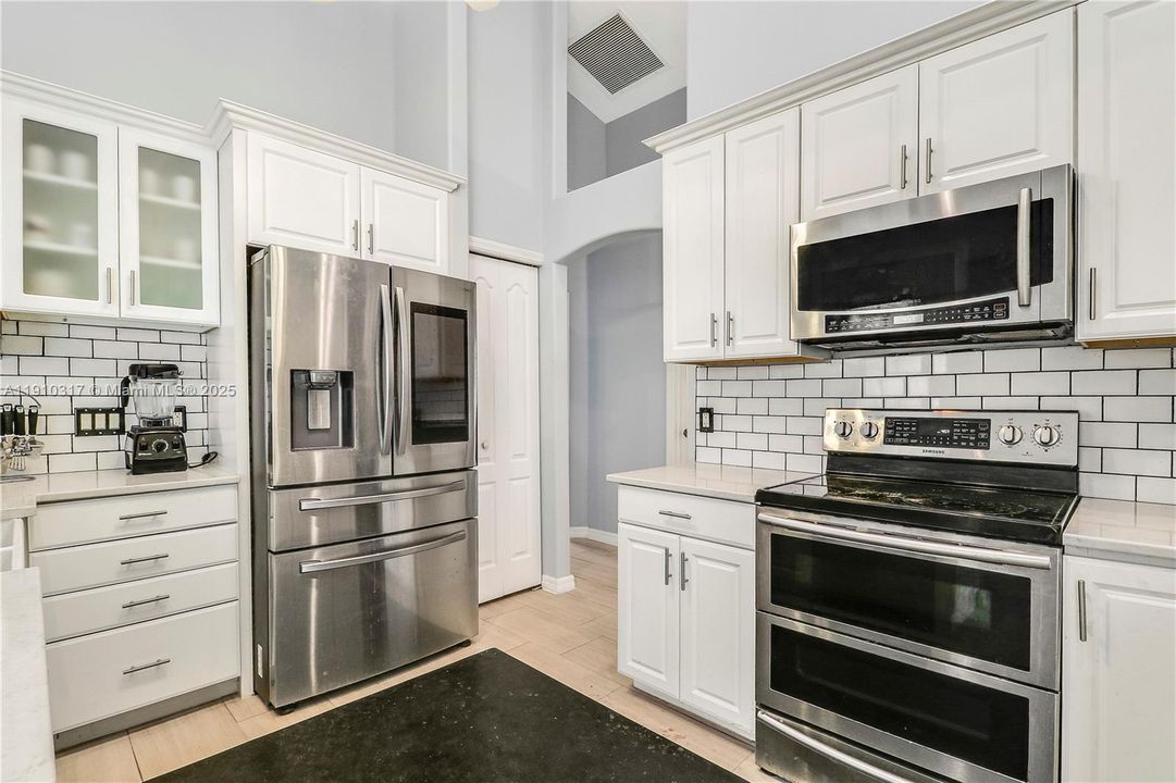 Kitchen with lots of storage and SS appliances