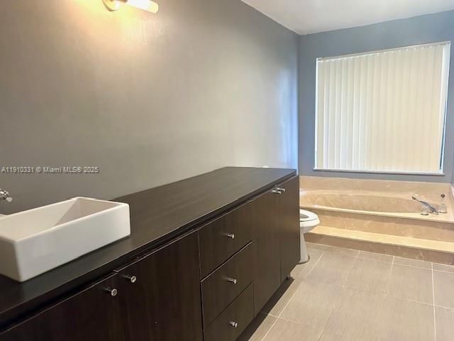 Walls have been painted neutral and there is a mirror.