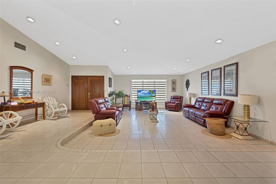 Foyer area and formal living room area