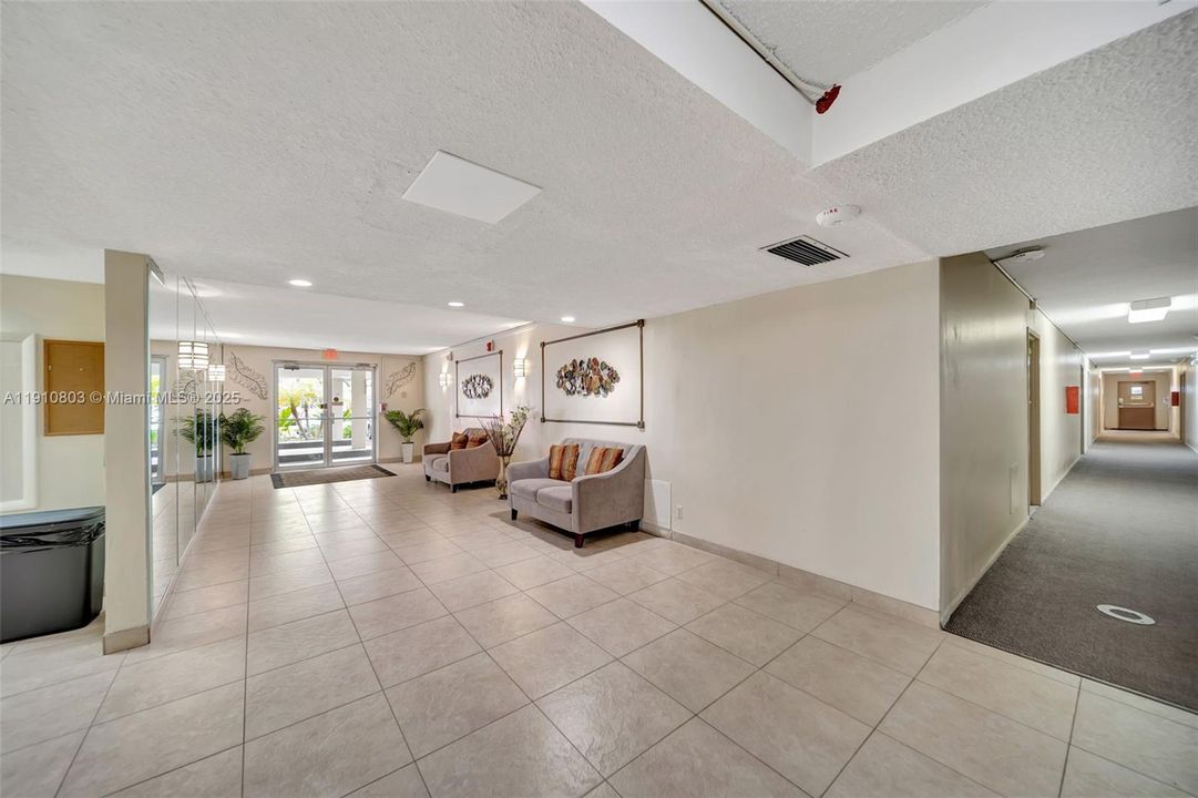 Building lobby has security doors with phone access